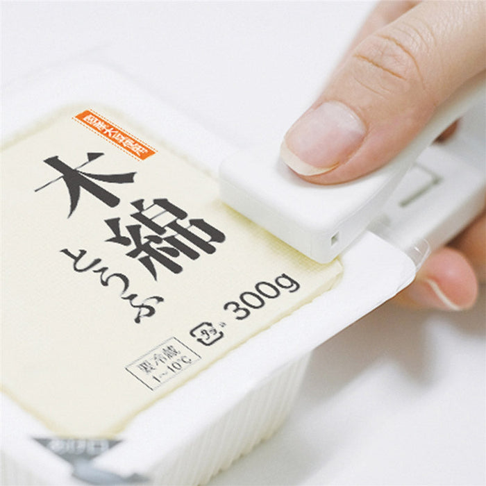 開封カッター　スパッター